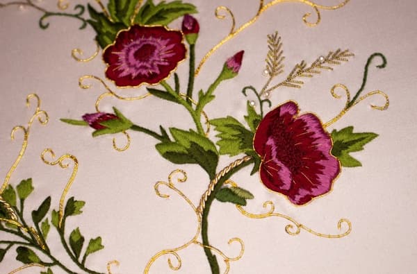 Hand and lock embroidery
